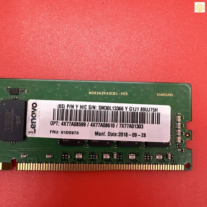 Computer RAM module with visible manufacturer labels and serial numbers.