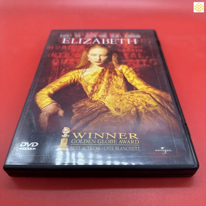 DVD case of the movie ’Elizabeth’ featuring a figure in a golden dress against a dark red background.