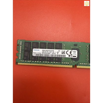 Computer RAM stick with visible chips and labeling.