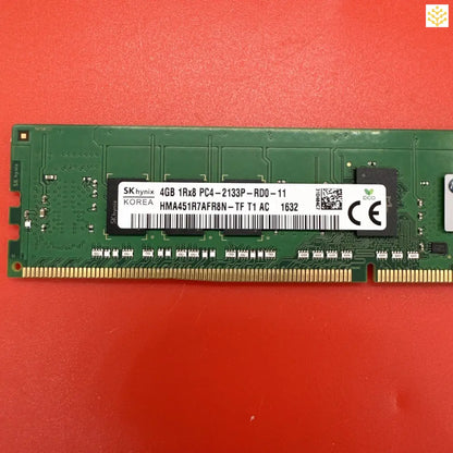 Computer RAM module with green circuit board.