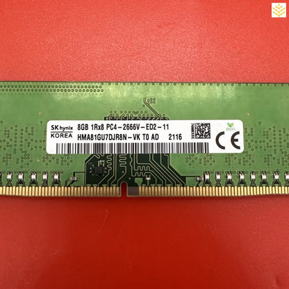 Computer RAM module with visible circuit board and product information label.