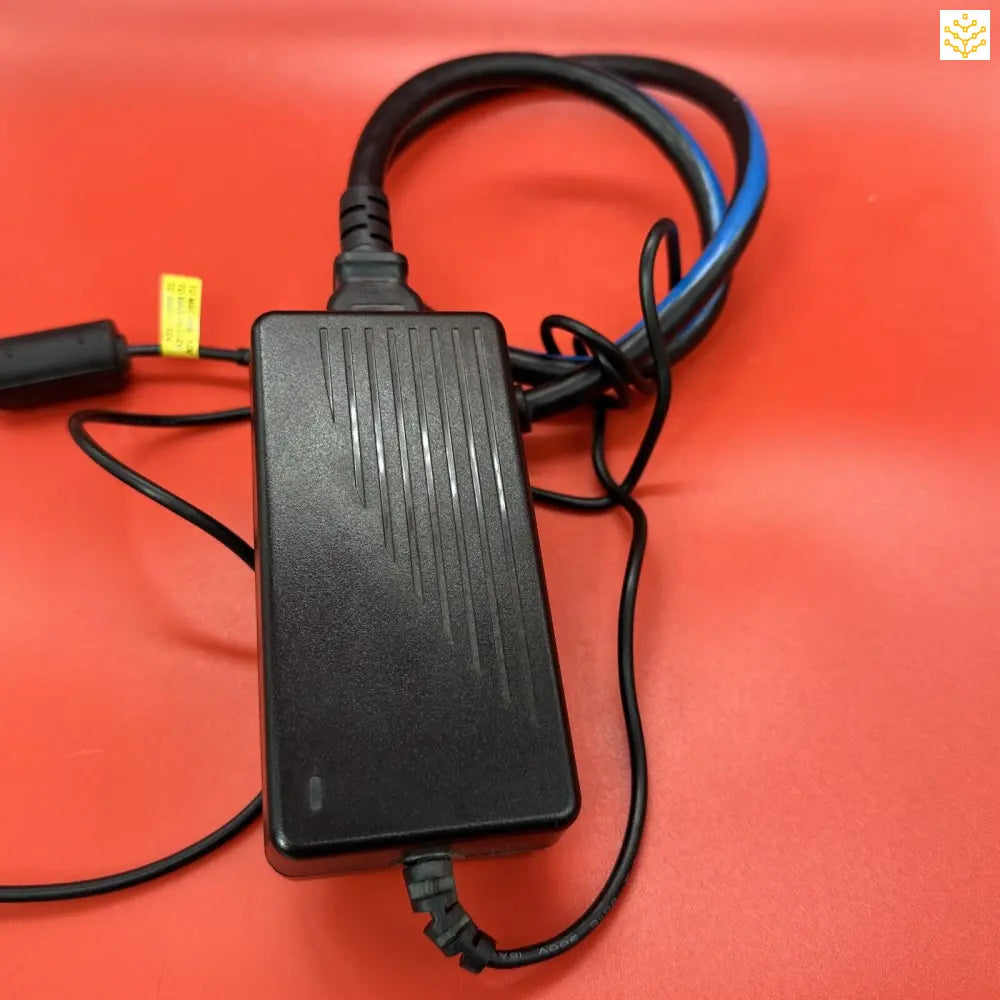 Power adapter or AC adapter with attached cables.