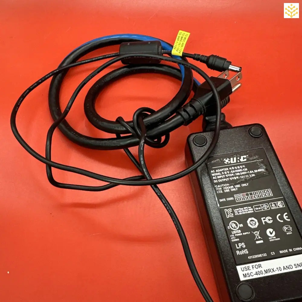 Power adapter with attached cables and alligator clips.