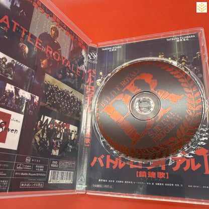 Japanese DVD case and disc for ’Battle Royale’ with red and black color scheme.