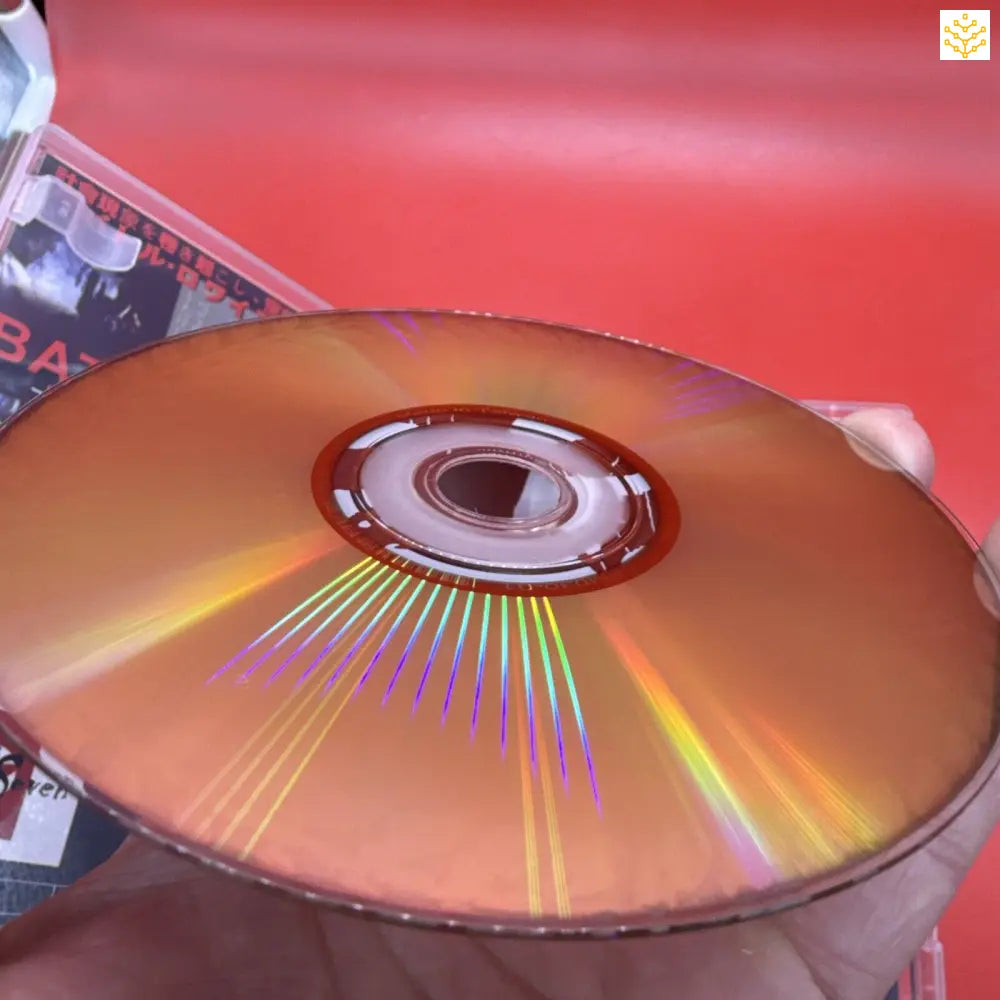 Compact disc (CD) reflecting rainbow colors across its metallic surface.