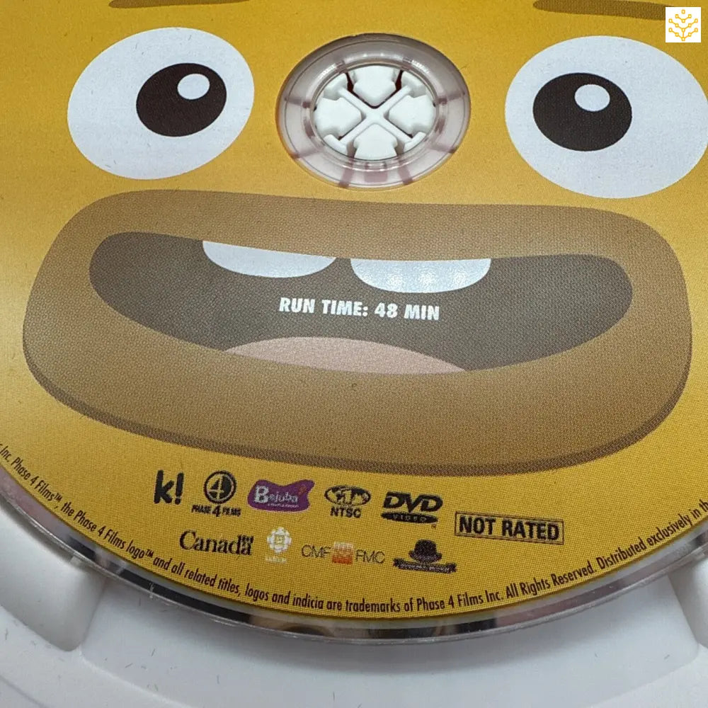 Yellow DVD disc with cartoon eyes and a smiling face design printed on it.