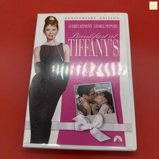 Anniversary Edition DVD of the classic film ’Breakfast at Tiffany’s’ with a pink and white cover design.