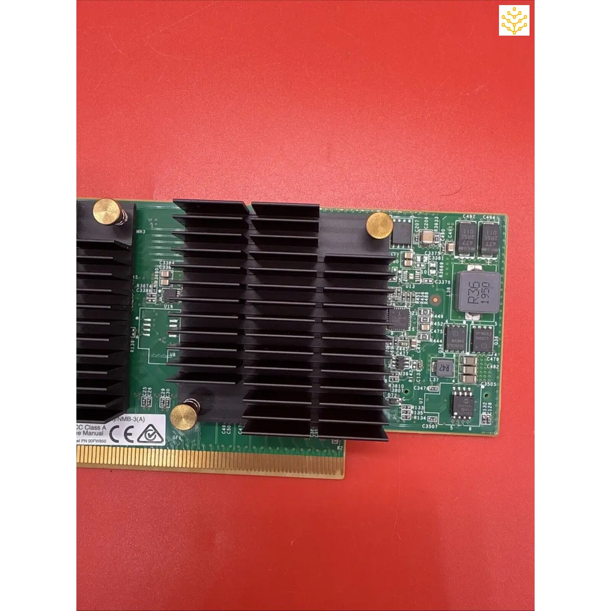 Computer graphics card with a prominent heat sink and circuit board.