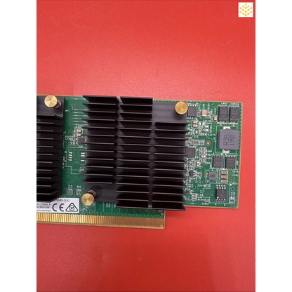 Computer graphics card with a prominent heat sink and circuit board.