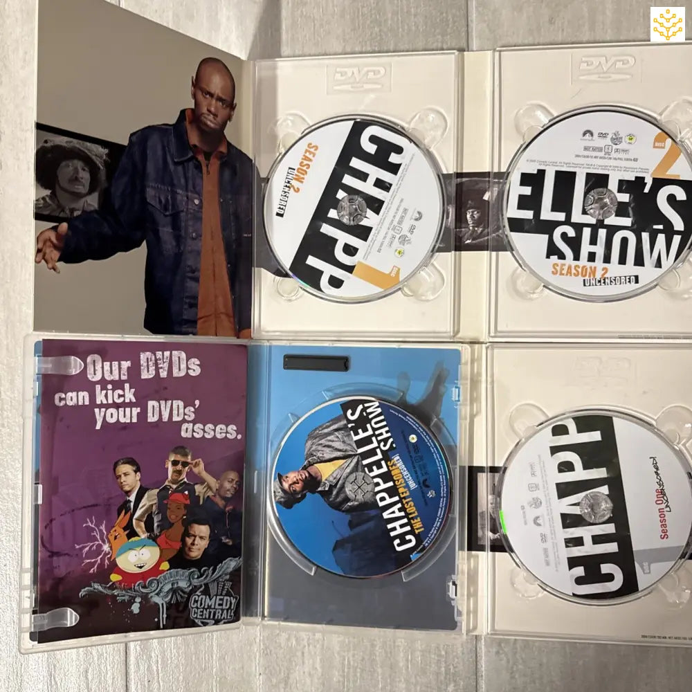 Collection of DVDs including ’Elle’s Show’ and other entertainment discs displayed together.