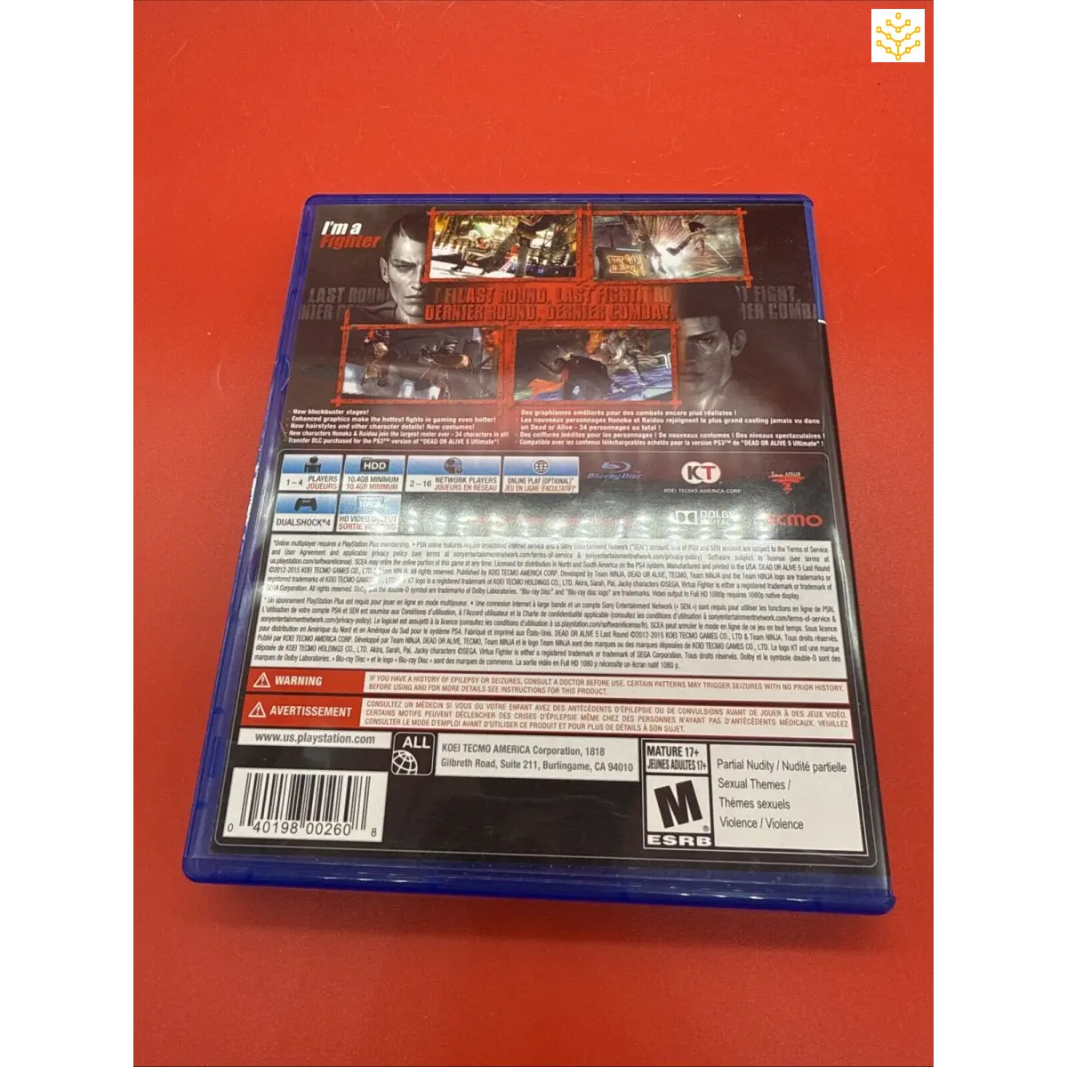 PlayStation 4 video game case for ’Resident Evil 2’’ on a red background.