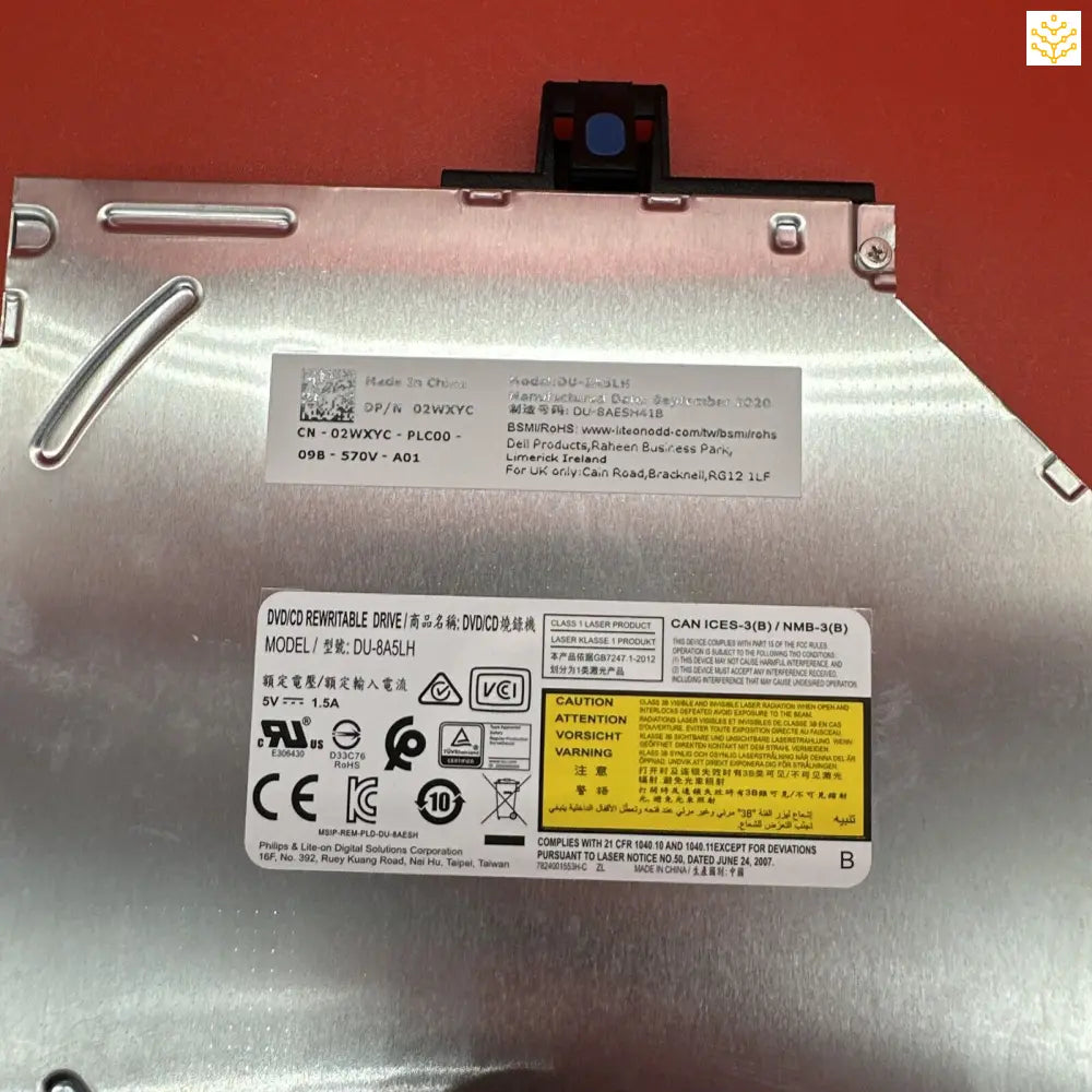 Optical disc drive unit with manufacturer labels and specifications visible.