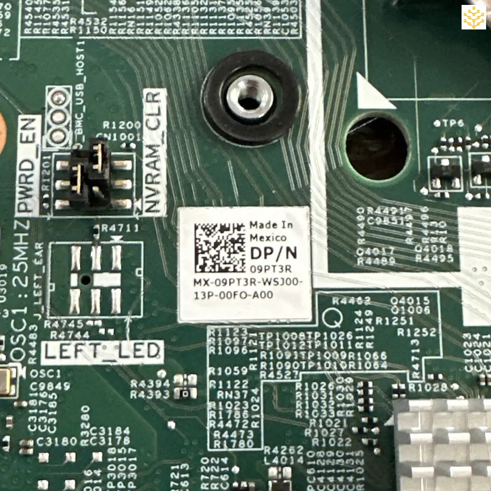 Circuit board with various electronic components and a ’Made in Mexico’ label.