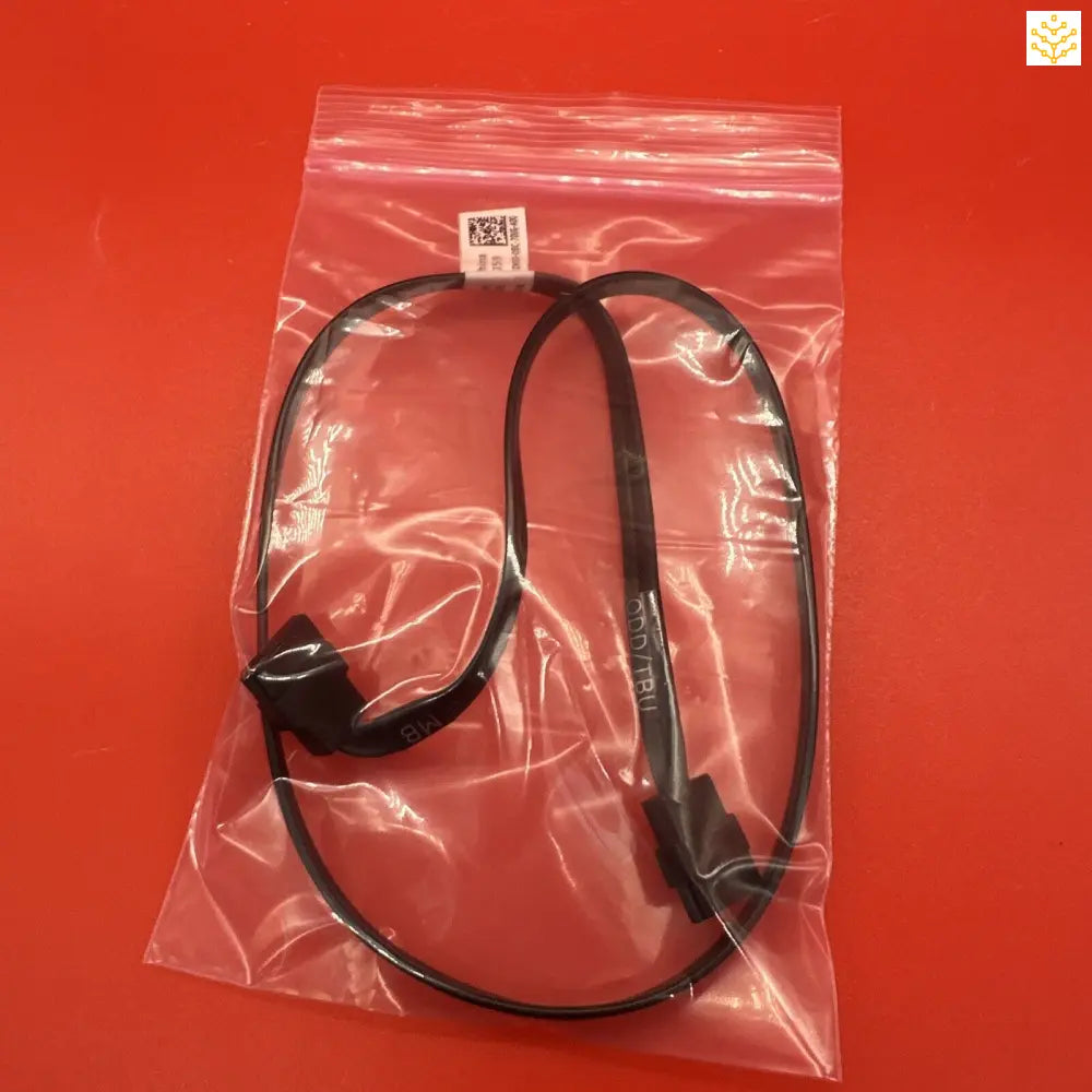 Headset or headphones sealed in a clear plastic bag.