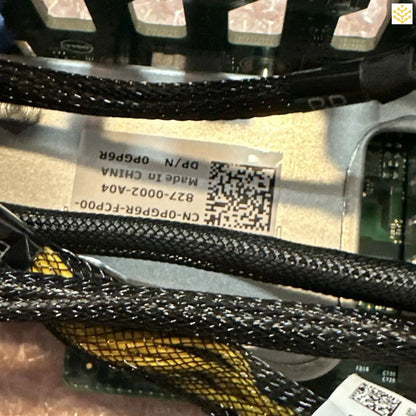 Computer cable or wire harness with braided sheathing and printed labels.