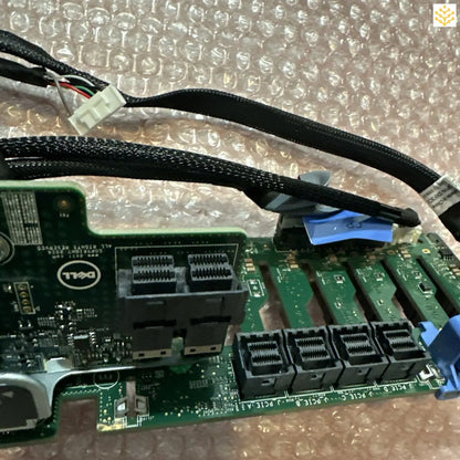 Computer circuit board with attached cables and connectors.