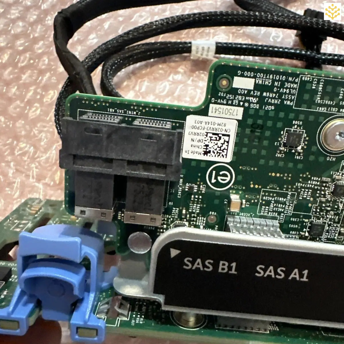 Circuit board with various connectors and components visible, including SAS ports.