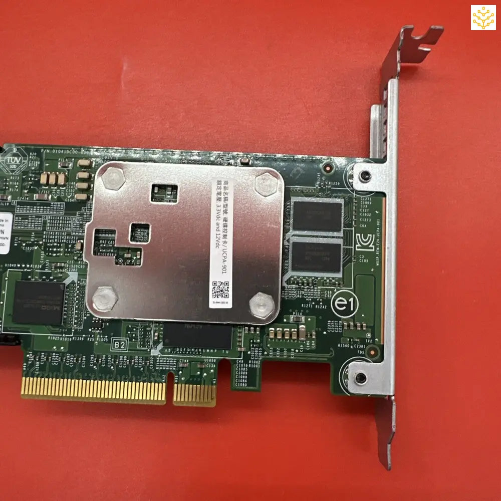 Computer expansion card with a metal heat spreader and visible circuit board components.