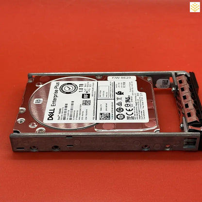 Hard drive mounted in a metal drive caddy or tray.