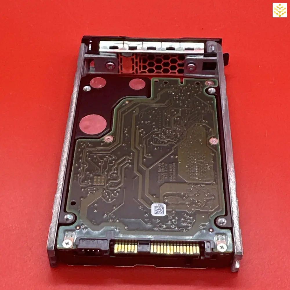 Hard drive or solid-state drive in a metal mounting bracket.