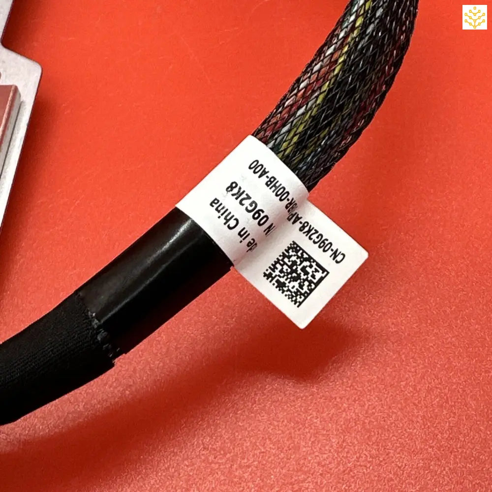 Braided cable or wire with a label attached.