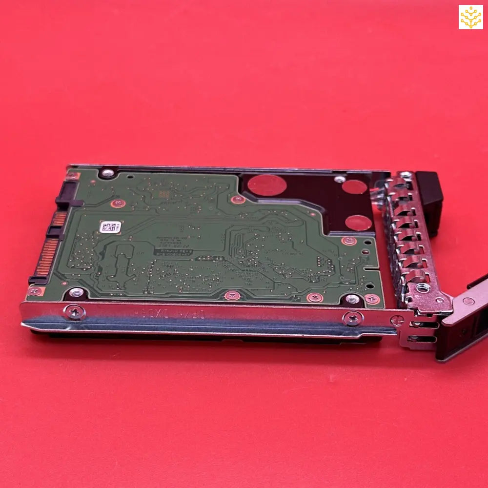 Hard drive or solid-state drive in a mounting bracket.