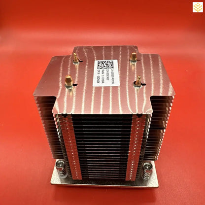 CPU heatsink with copper-colored fins and mounting screws.