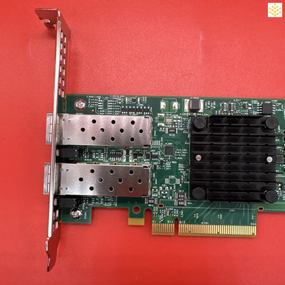 Network interface card with dual SFP ports and a heatsink.