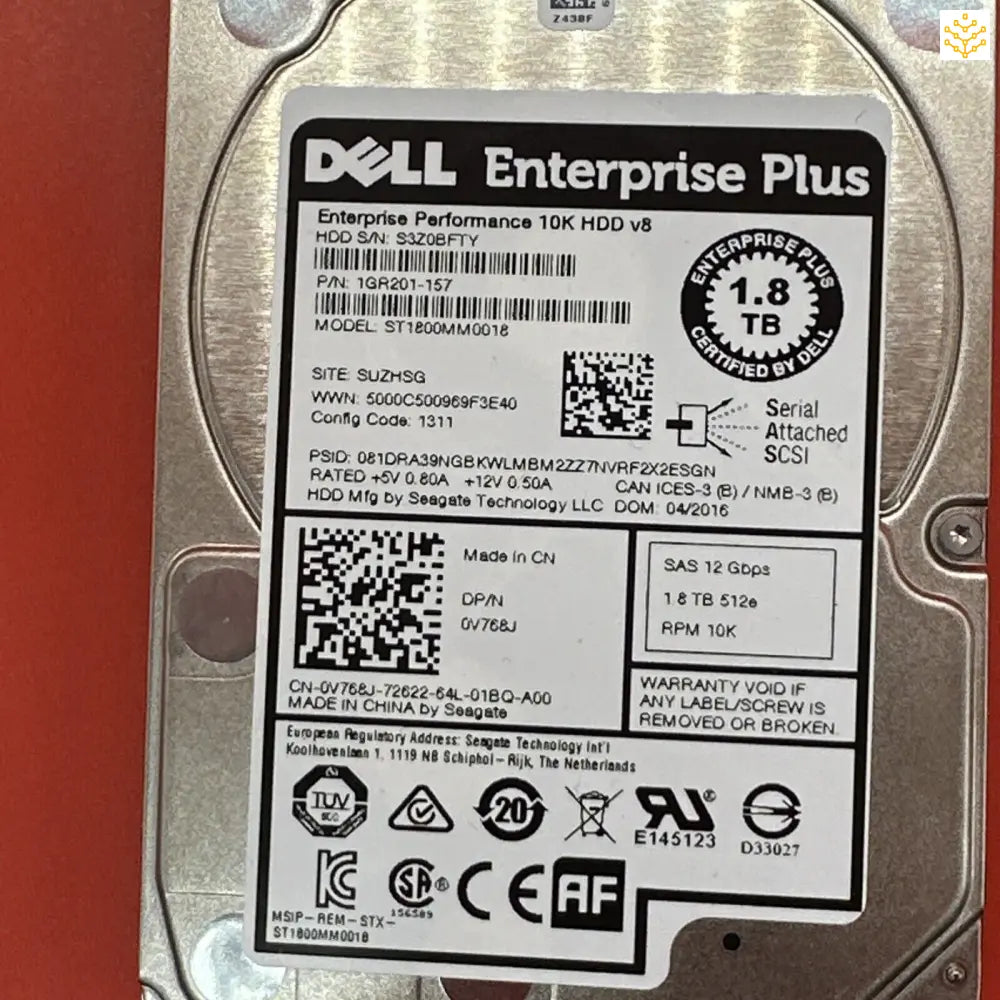 Dell Enterprise Plus 1.8 TB hard disk drive with detailed specification label.