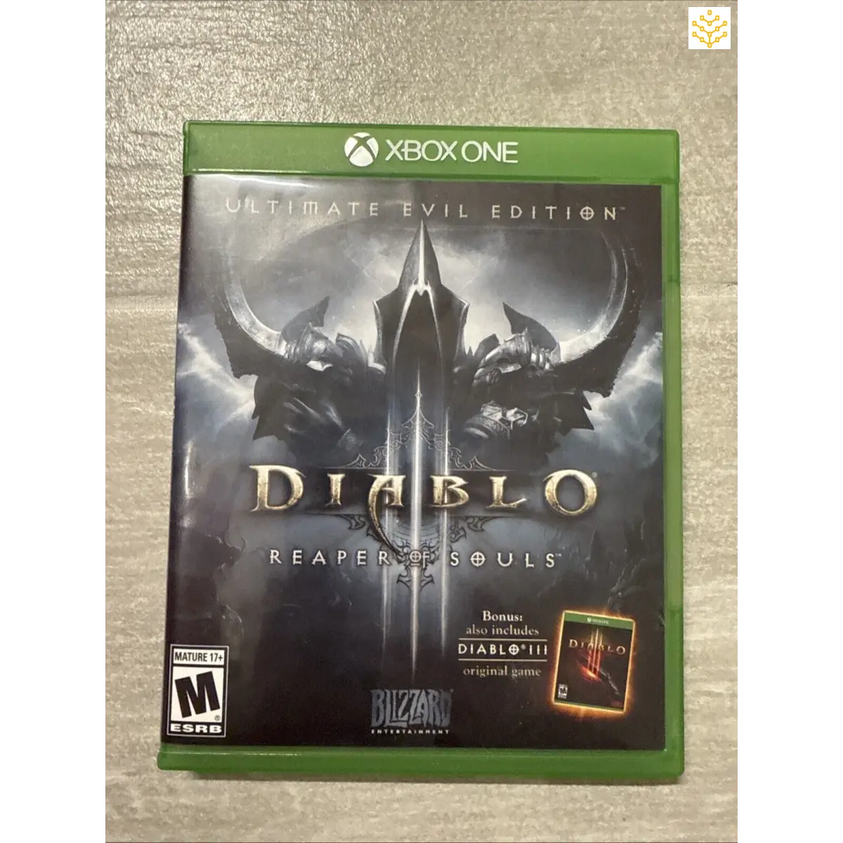 Xbox One game case for Diablo III: Reaper of Souls Ultimate Evil Edition.