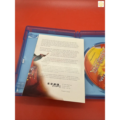 Open Blu-ray case containing a disc and a paper insert with text.