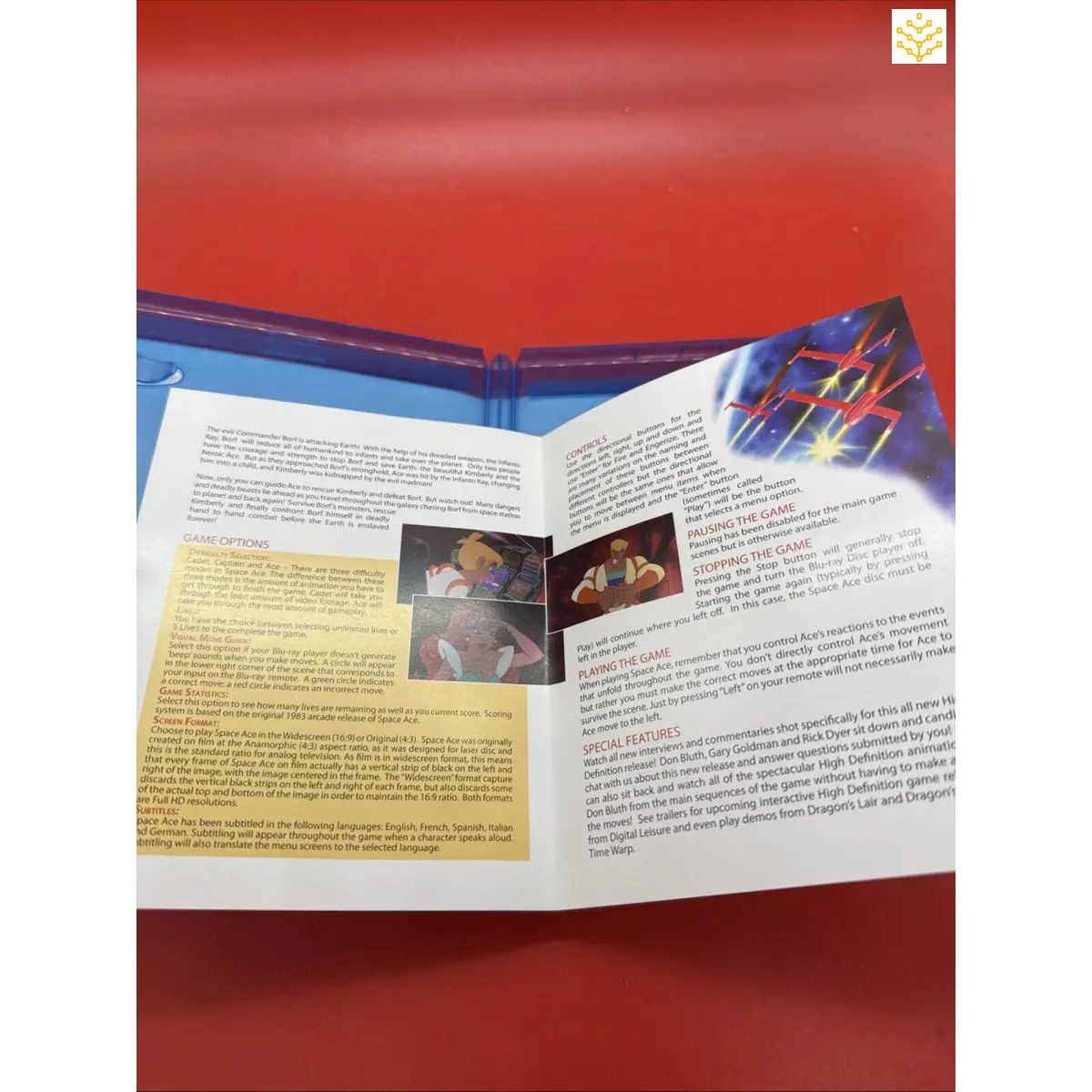 Open textbook or educational material with colorful pages and images.