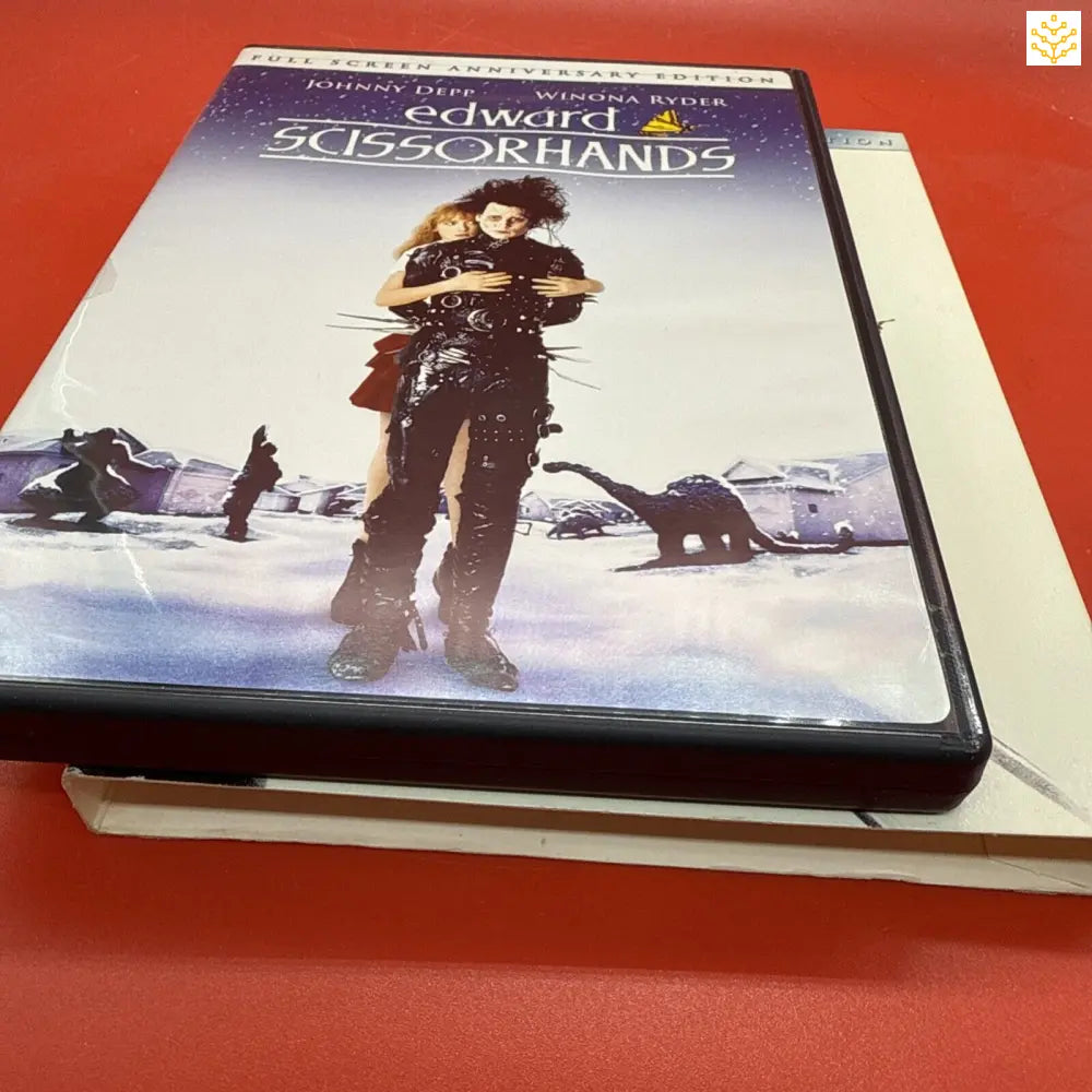 DVD case of the movie ’Edward Scissorhands’ resting on a surface.