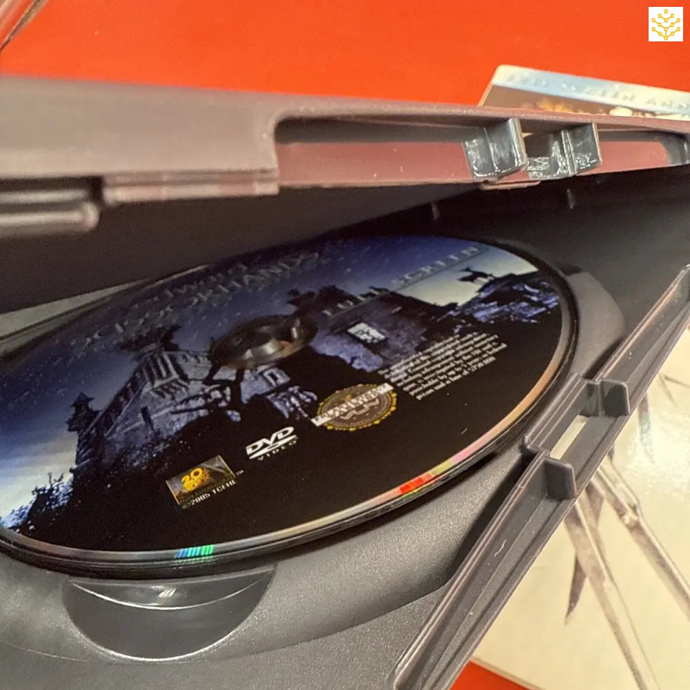 DVD disc inside an open DVD case.