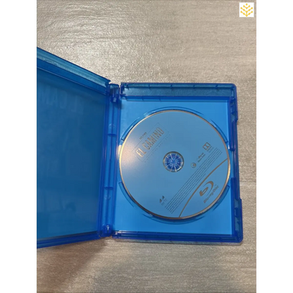 Blu-ray disc inside an opened blue plastic case.