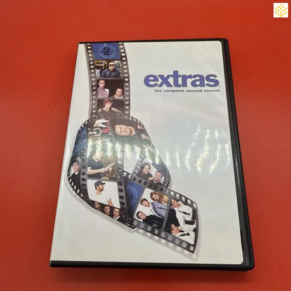 DVD case for the television series ’Extras’ featuring a film strip design.