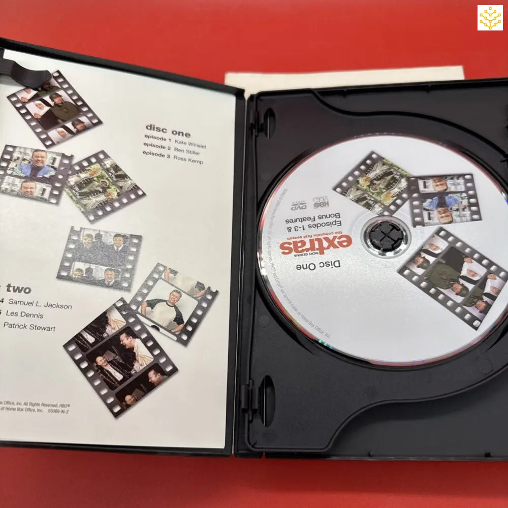 DVD case opened to show disc and insert with film strip design elements.