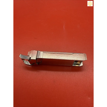 Vintage nail clipper with an elongated metal body and folding lever mechanism.