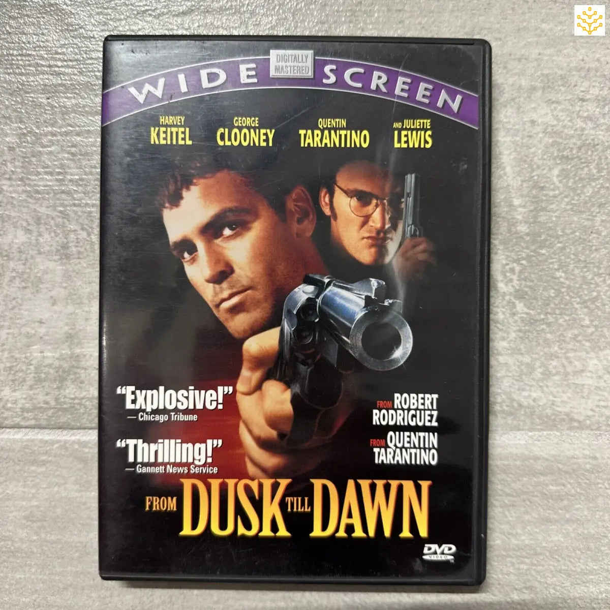 DVD case for the movie ’From Dusk Till Dawn’ featuring two men on the cover.