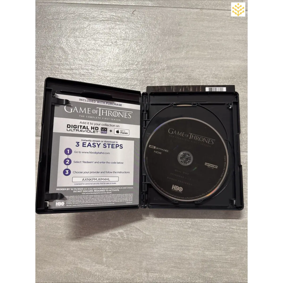 DVD case for Game of Thrones containing a disc and digital download information.