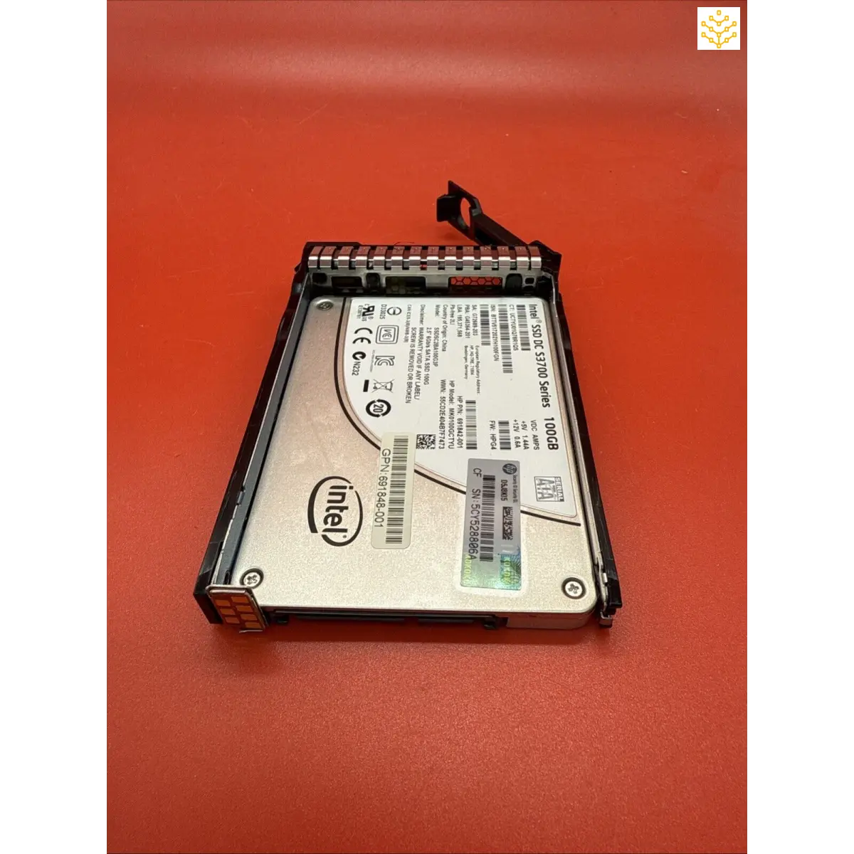 Hard drive in a mounting bracket or caddy.