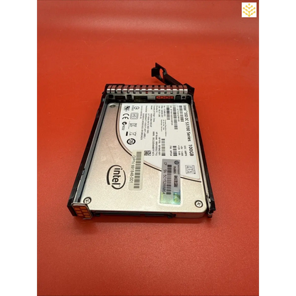 Hard drive in a mounting bracket or caddy.