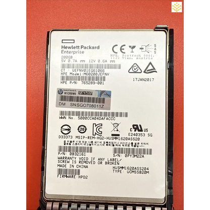 Hewlett Packard Enterprise solid-state drive (SSD) with product information and regulatory markings visible on its label.