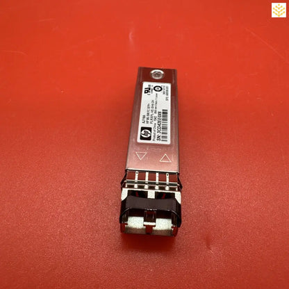 HP fiber optic SFP transceiver module with dual LC connectors.