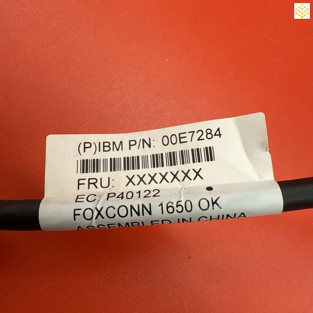 Product label showing IBM part number and Foxconn manufacturing information.