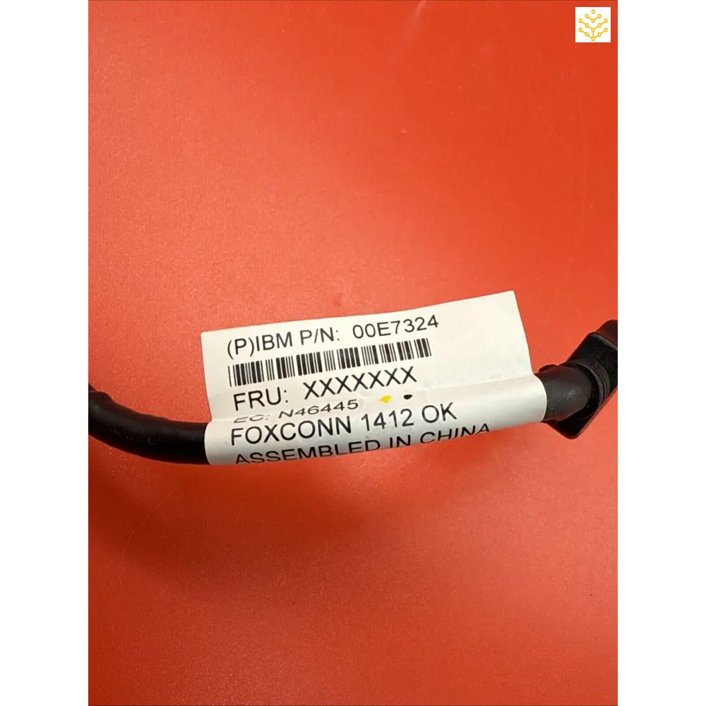 Product label showing part number 00E7324 and Foxconn manufacturing information.