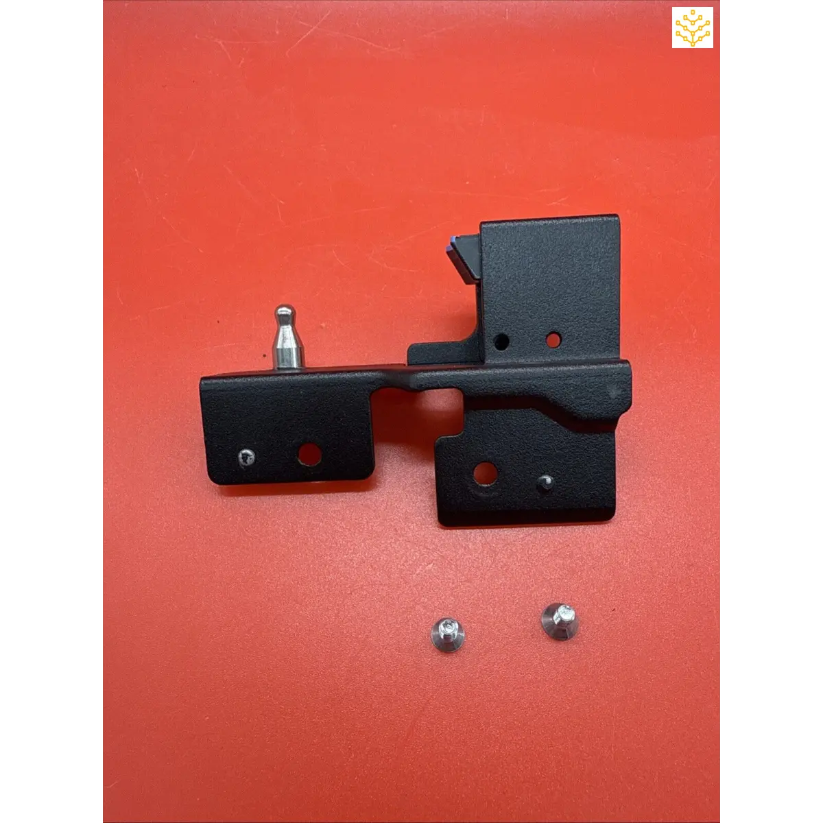 Black metal mounting brackets with screws.