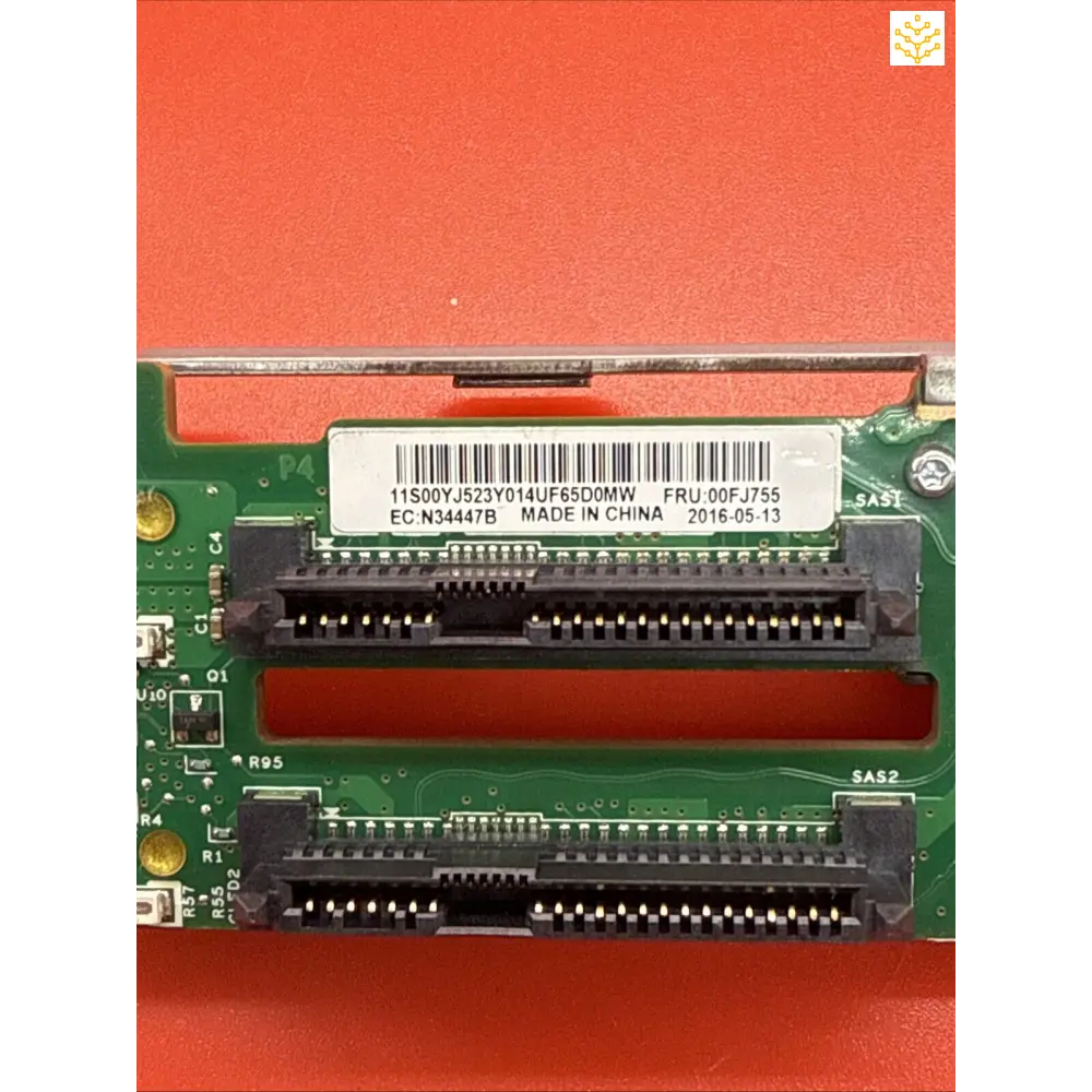 Circuit board with two parallel black connector ports and a barcode label.