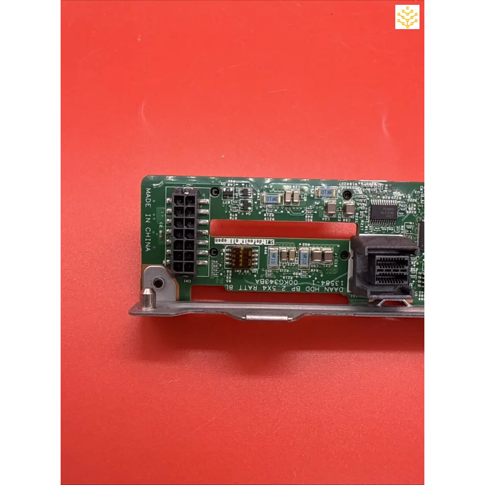 Circuit board with electronic components and connectors mounted on a metal bracket.