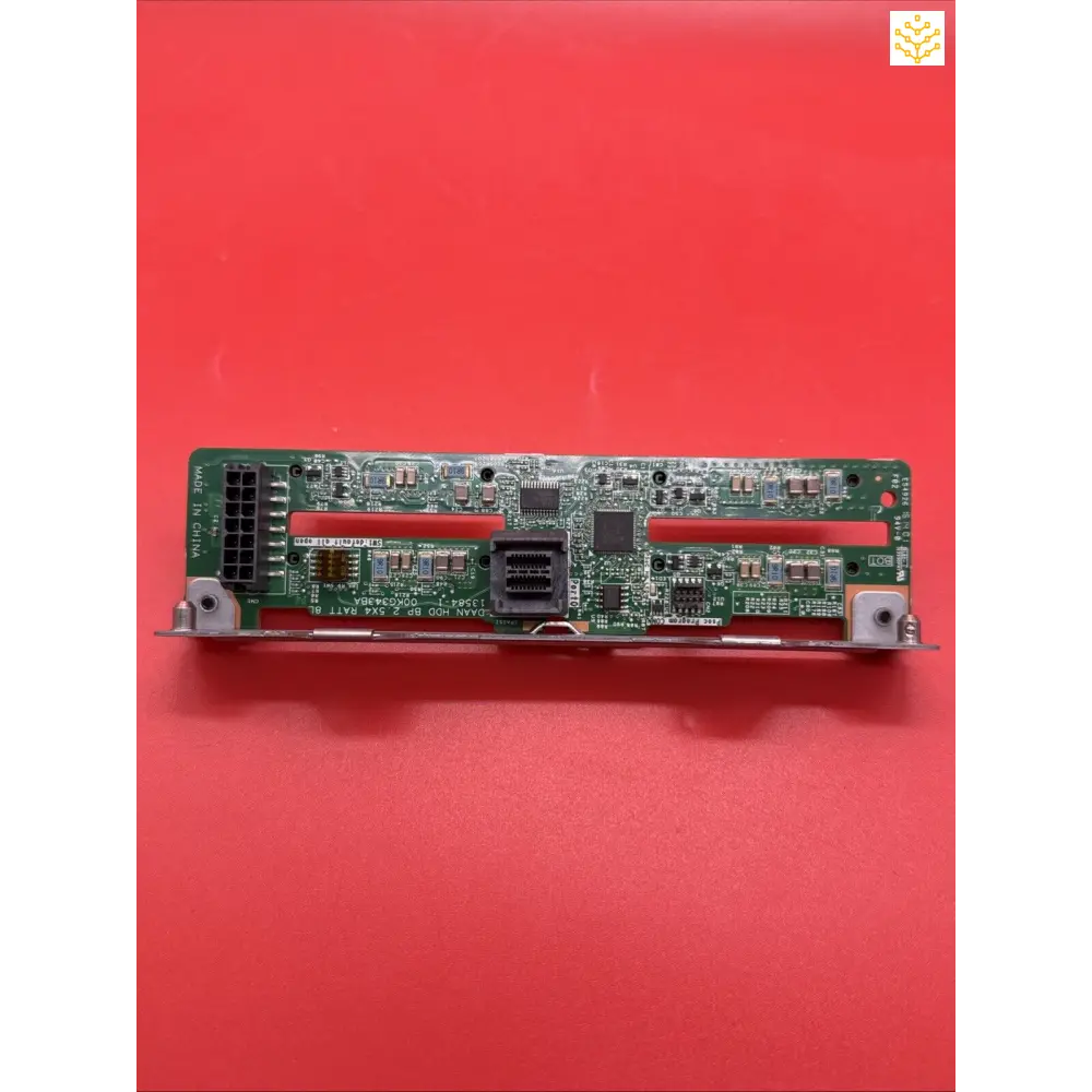 Circuit board with electronic components and connectors mounted on a metal plate.